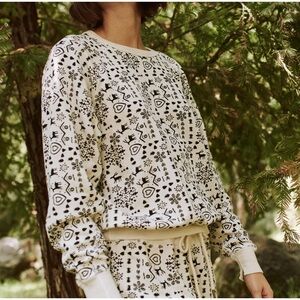 THE GREAT The College Sweatshirt in Washed White Folk Print 1